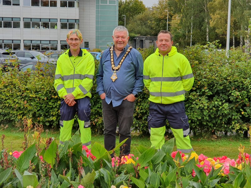 The Mayor of Causeway Coast and Glens Borough Council, Councillor Ivor Wallace, pictured with Parks staff Rodney Boyd and Winston Brogan.