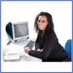 A person sitting at a desk with a computer