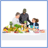 A group of people sitting at a table talking about healthy food