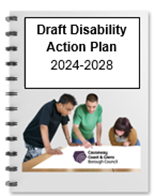 A close-up of a spiral bound notebook which says Disability Action Plan 2024-2028